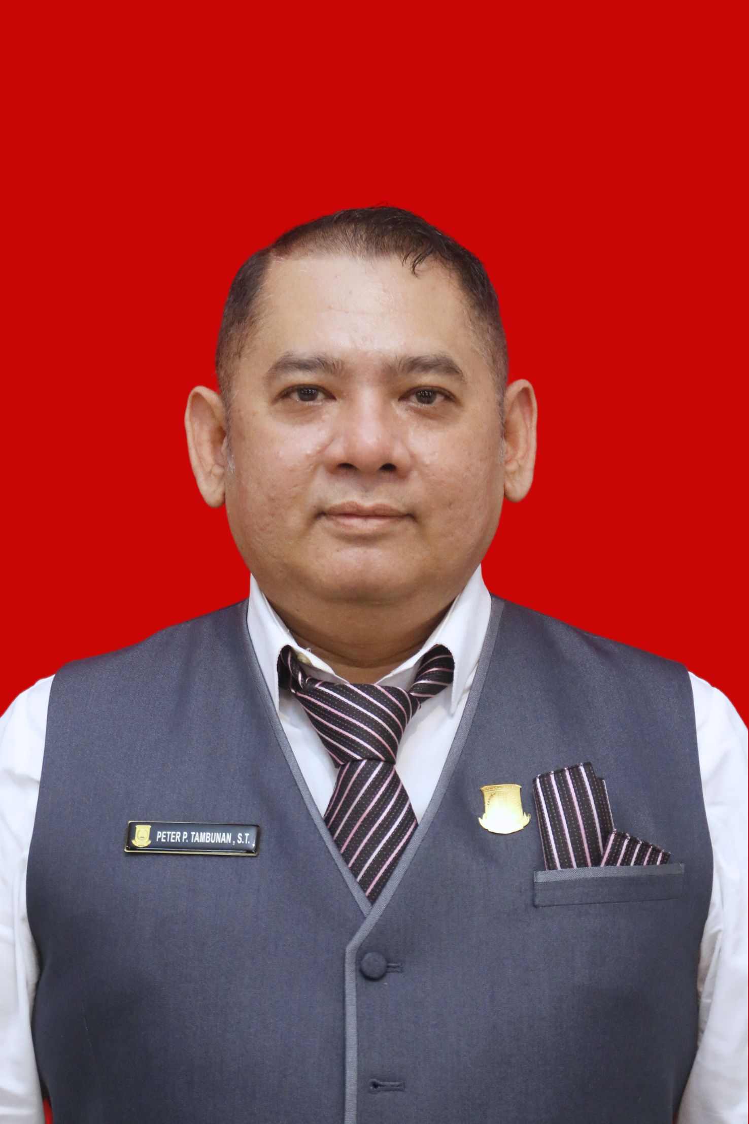 Peter Parasi Tambunan, S.T