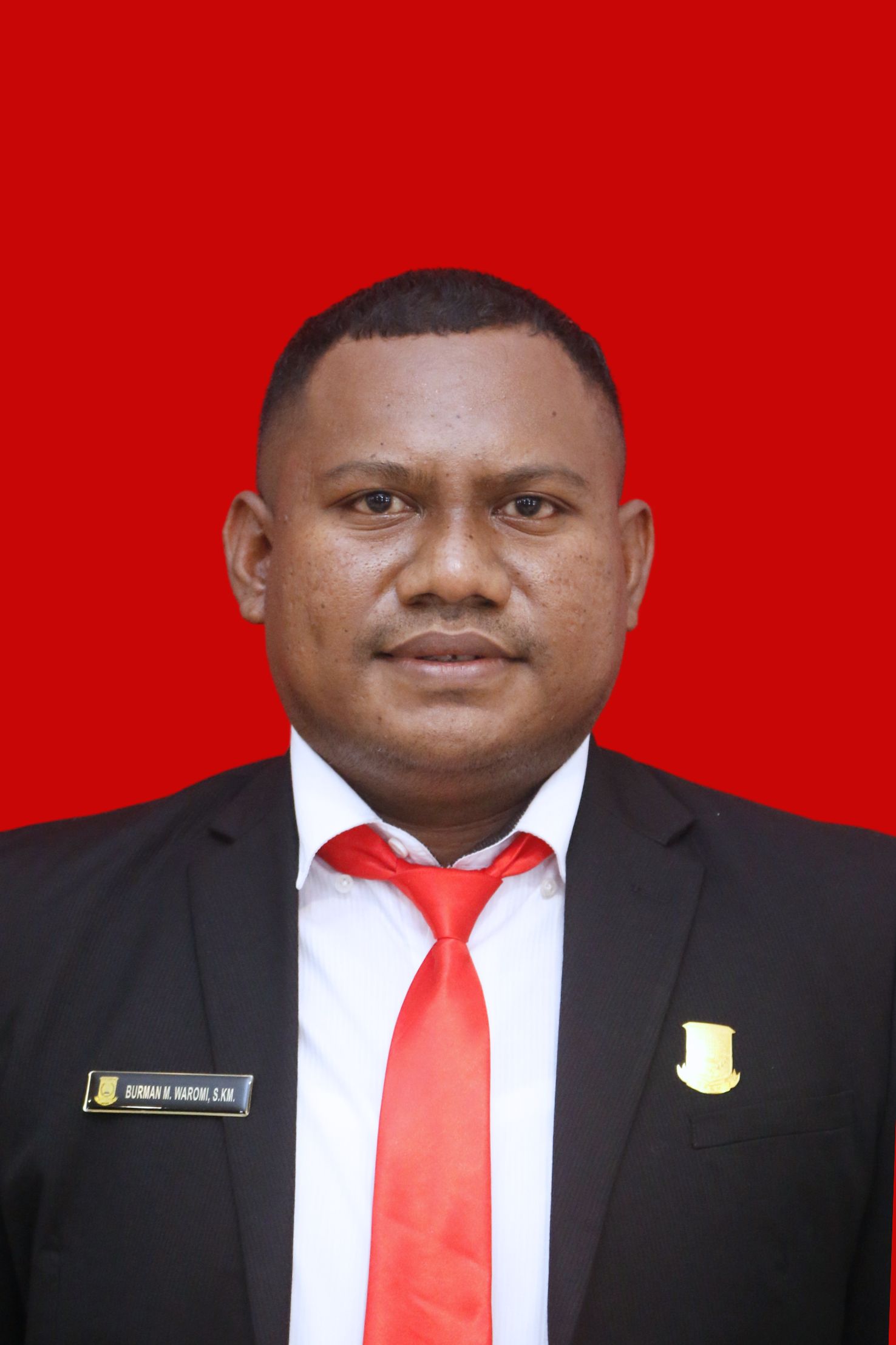 Burman Minson Waromi, S.KM